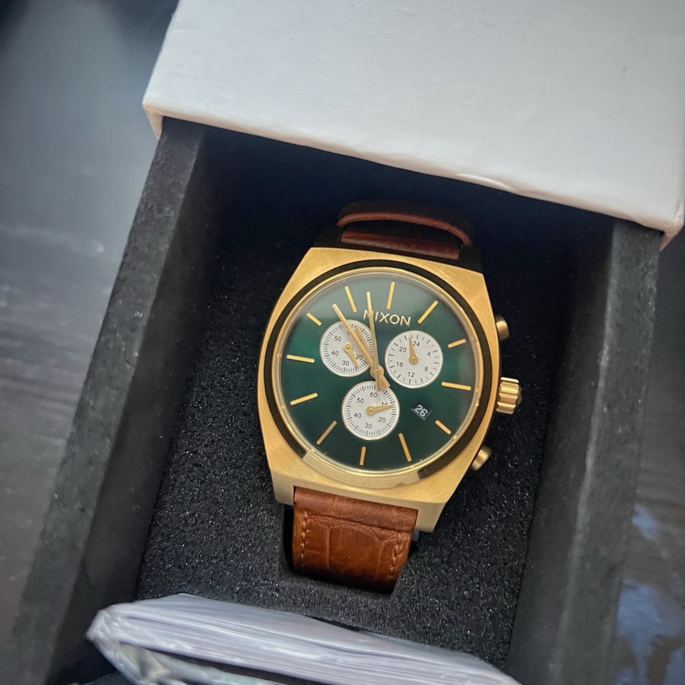 Nixon Gold Watch with Green Dial and Brown Strap